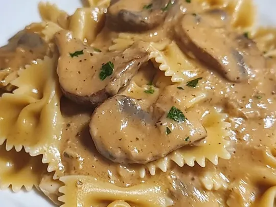 Farfalle con crema di carciofi e cuori trifolati