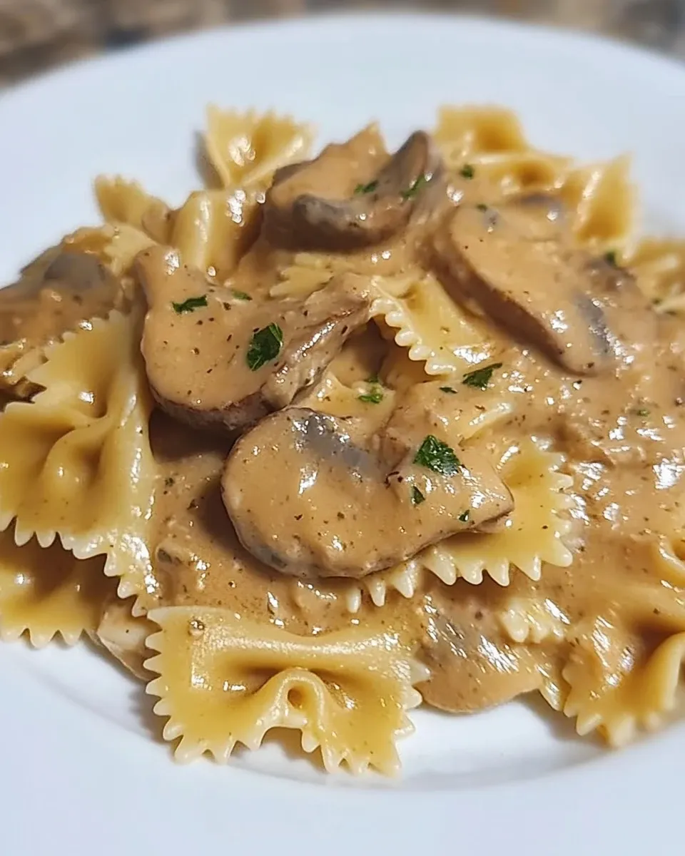 Farfalle con crema di carciofi e cuori trifolati