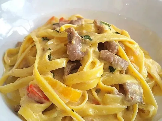 Tagliatelle con Fiori di Zucca e Speck