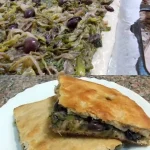 Piatto tradizionale della cucina meridionale italiana con ingredienti freschi.